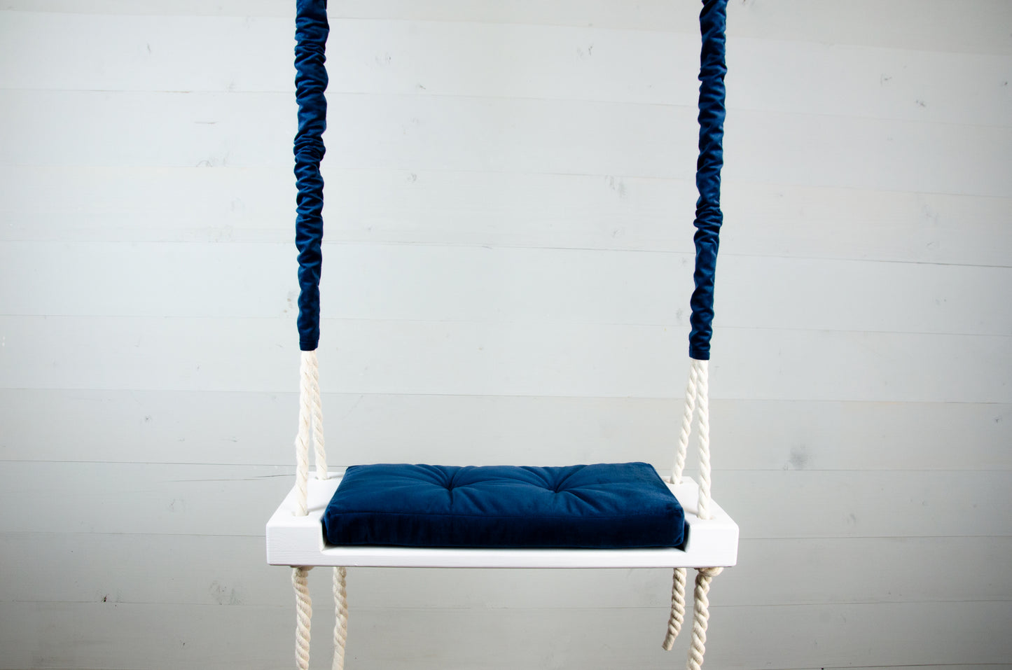 Children's Inside White Swing With A Blue Seat
