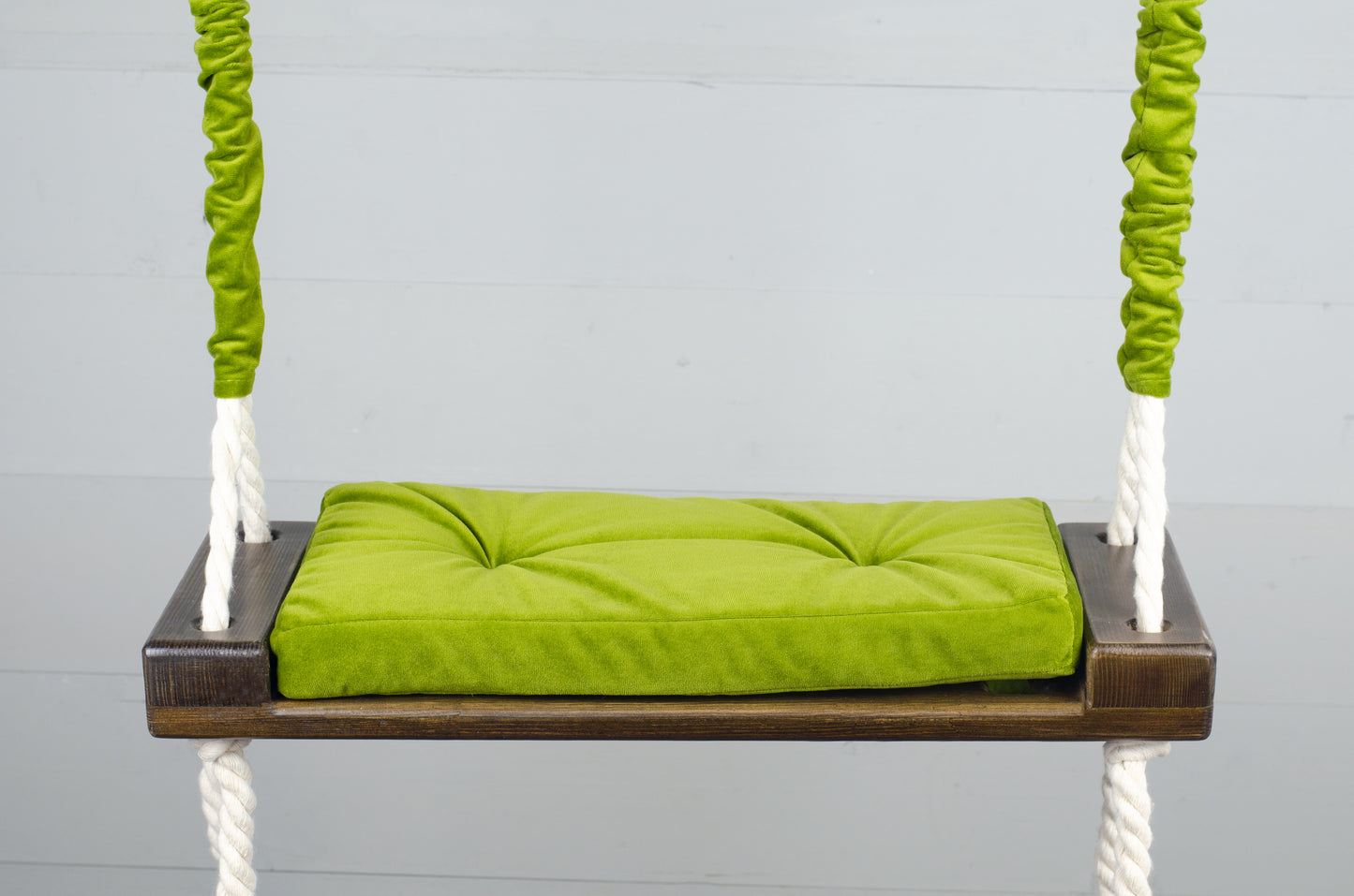 Children's Inside White Swing With A Green Seat