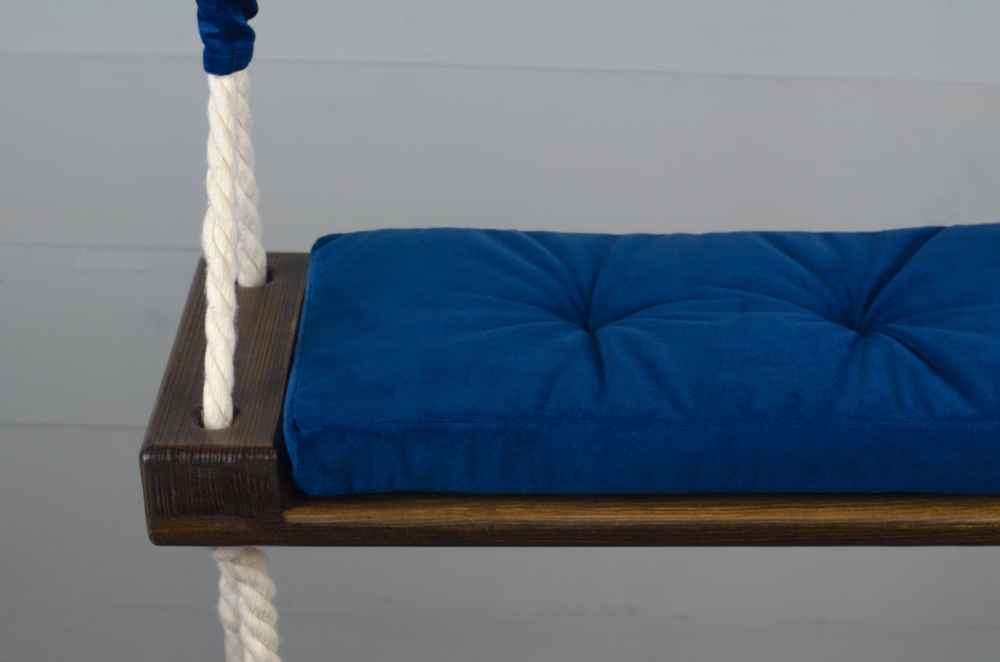 Children's Inside Natural Swing With A Blue Seat