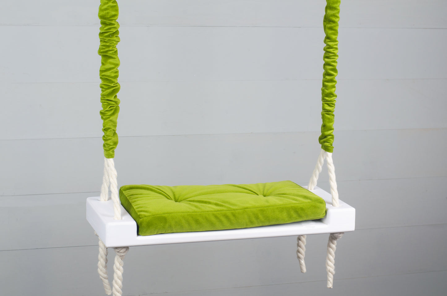 Children's Inside White Swing With A Green Seat