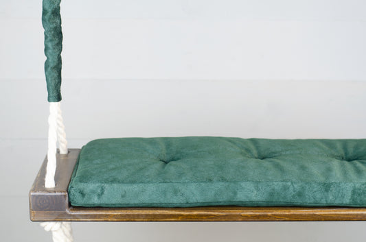 Adult Inside Natural Swing With A Green Seat