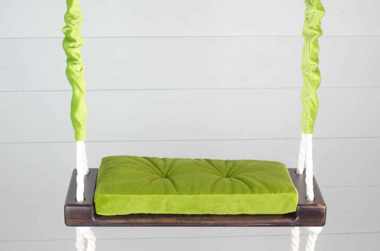 Children's Inside White Swing With A Green Seat
