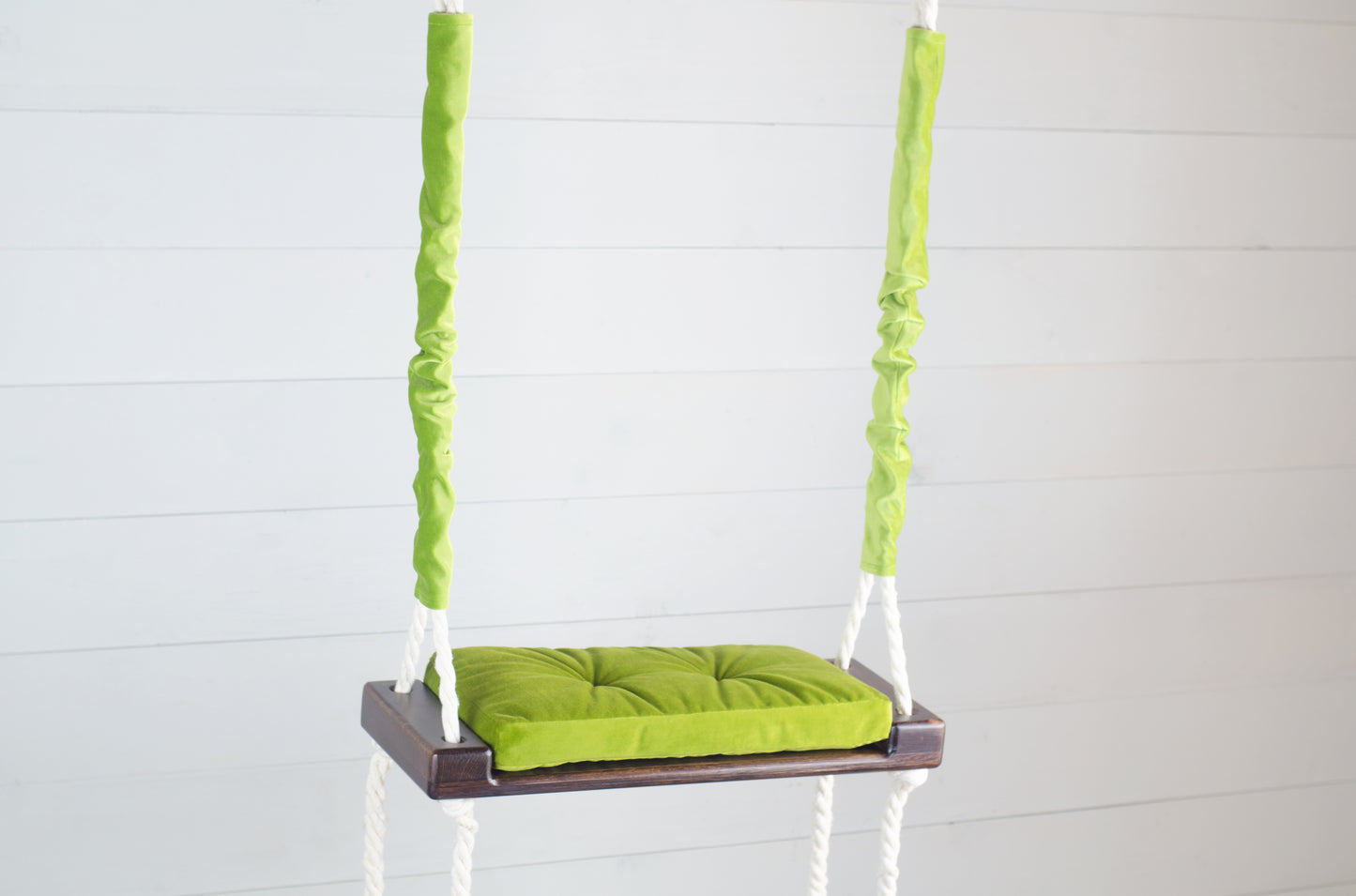 Children's Inside White Swing With A Green Seat