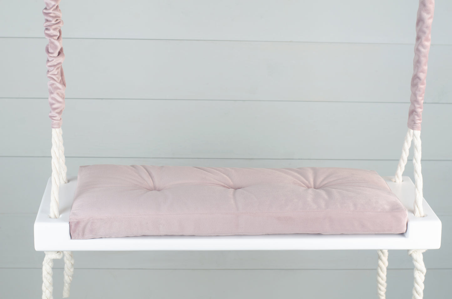 Adult Inside White Swing With A Pink Seat