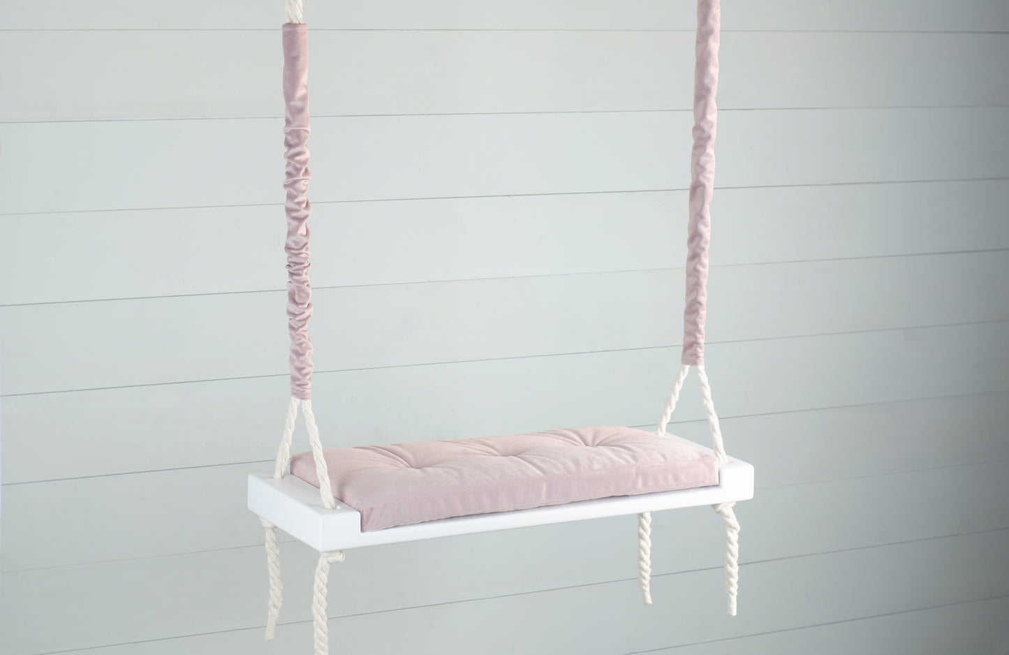 Adult Inside White Swing With A Pink Seat