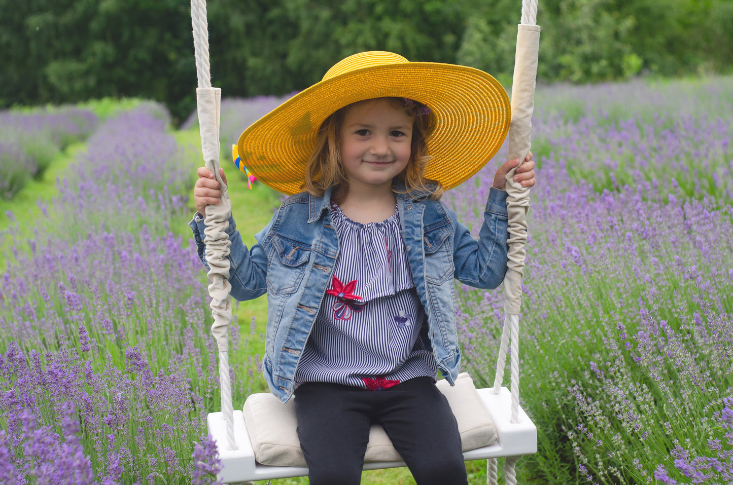 Children's Inside White Swing With A Beige Seat