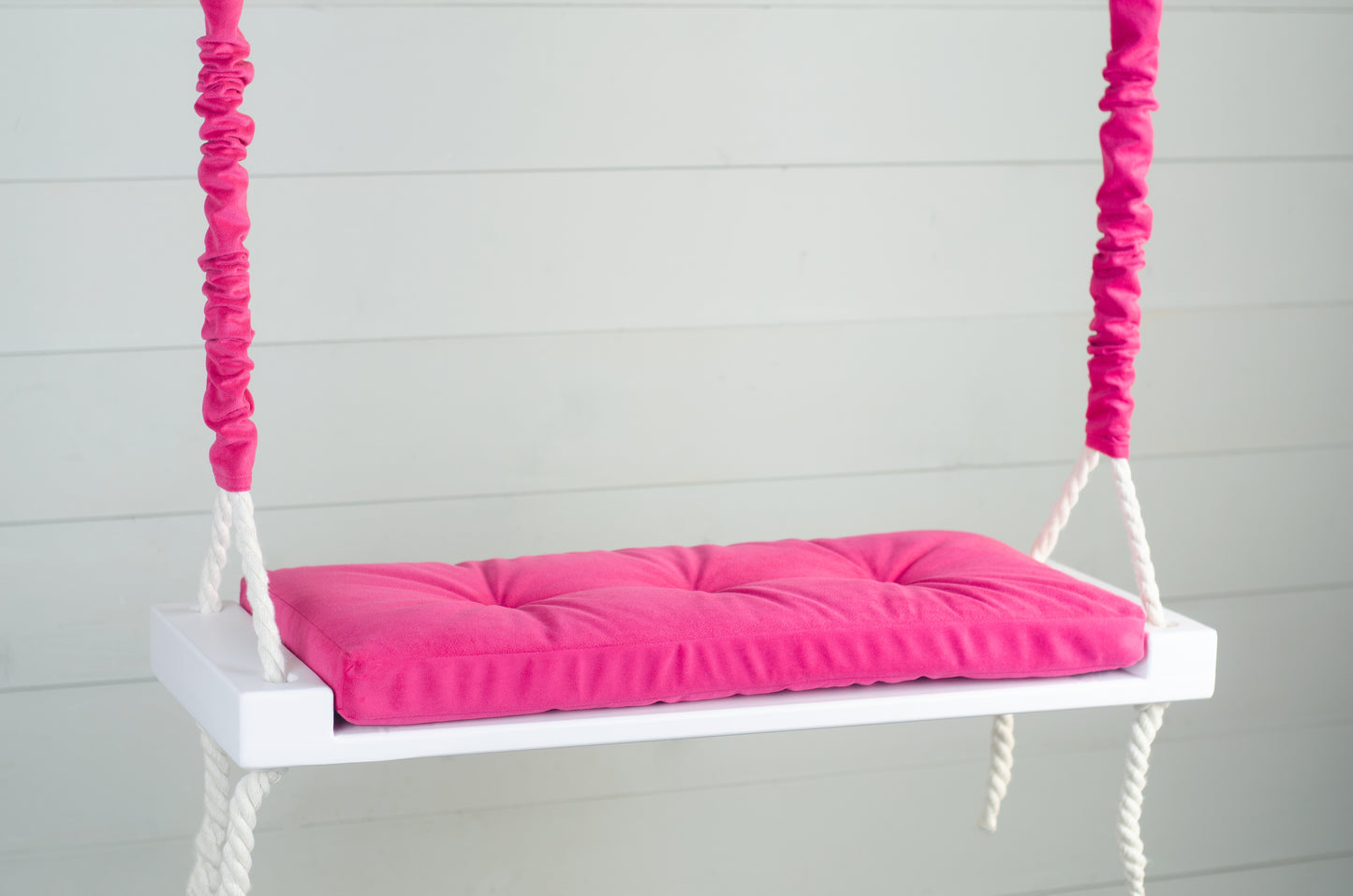Adult Inside White Swing With A Hot Pink Seat