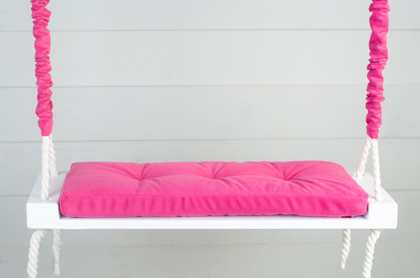 Adult Inside White Swing With A Hot Pink Seat