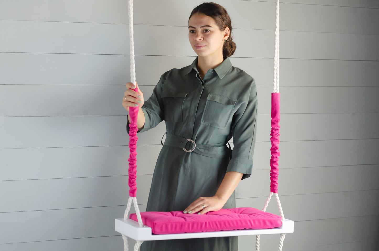 Adult Inside White Swing With A Hot Pink Seat