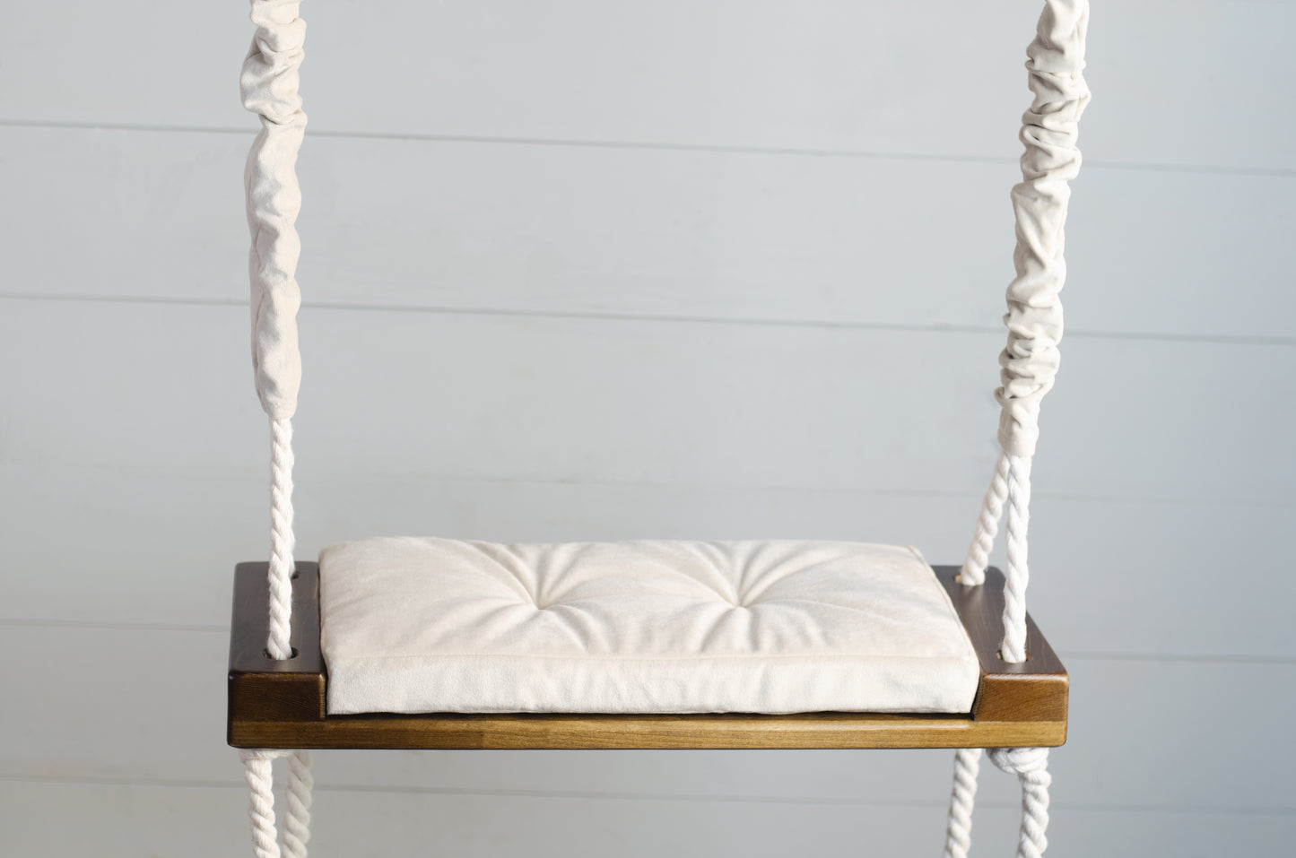 Children's Inside Natural Swing With A Beige Seat