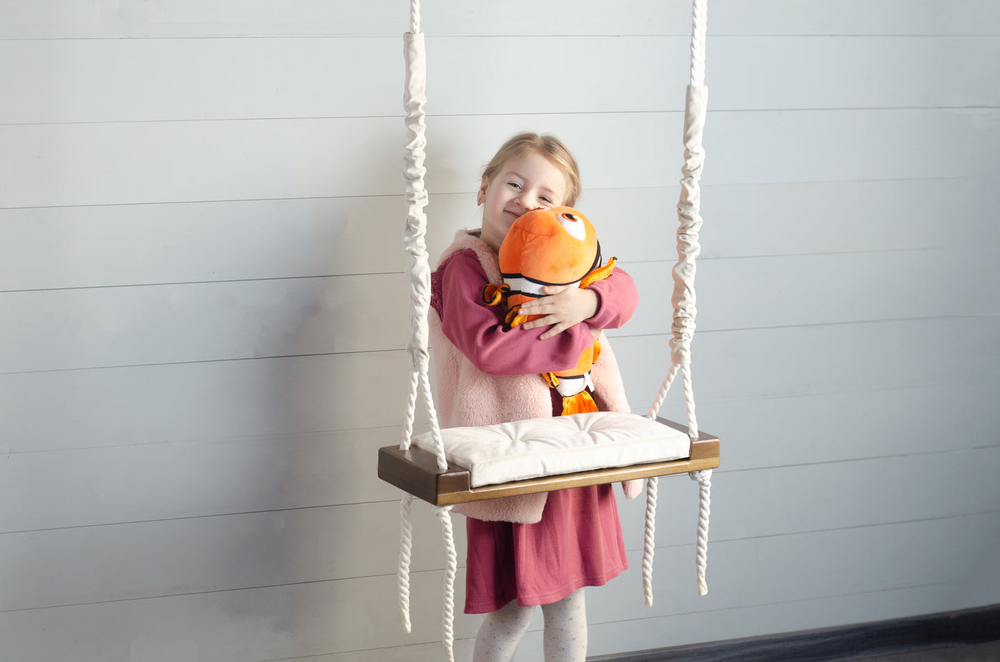 Children's Inside Natural Swing With A Beige Seat