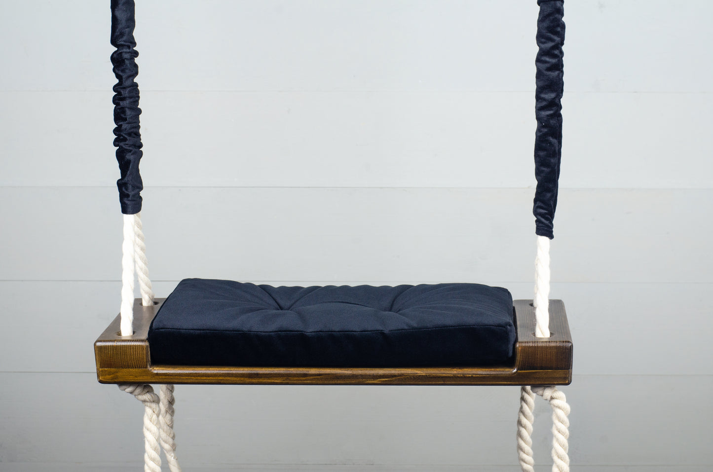 Children's Inside Natural Swing With A Black Seat