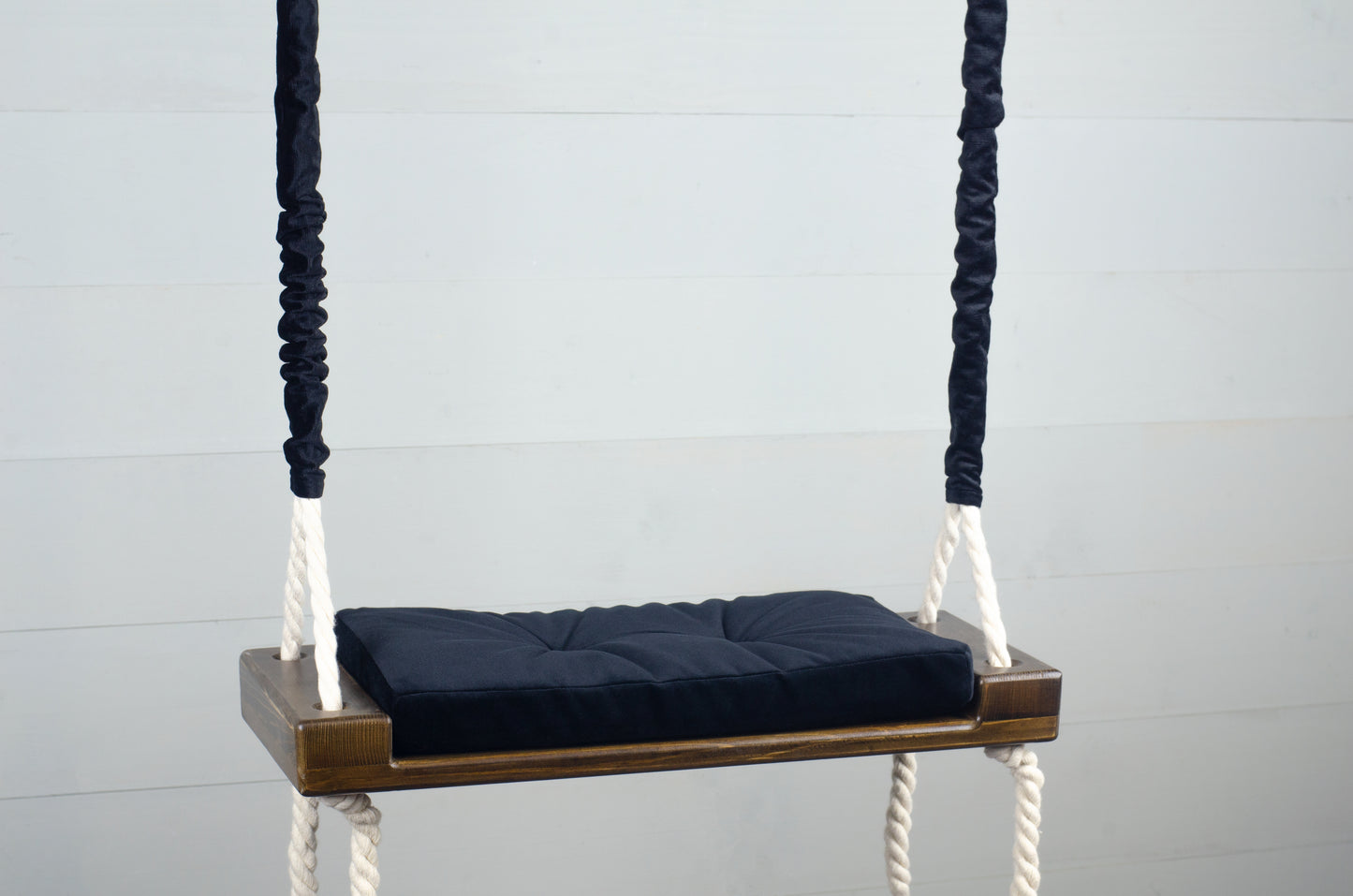 Children's Inside Natural Swing With A Black Seat