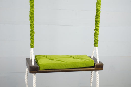 Children's Inside White Swing With A Green Seat
