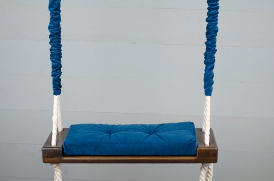 Children's Inside Natural Swing With A Blue Seat
