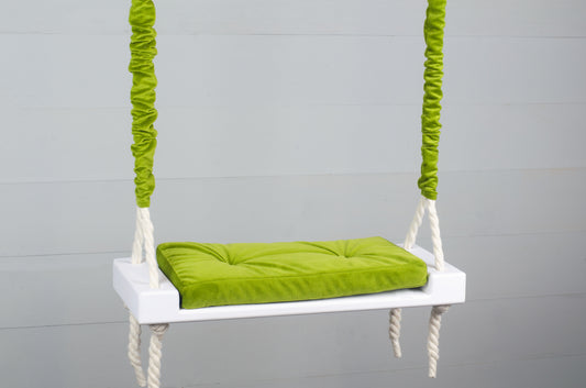 Children's Inside White Swing With A Green Seat