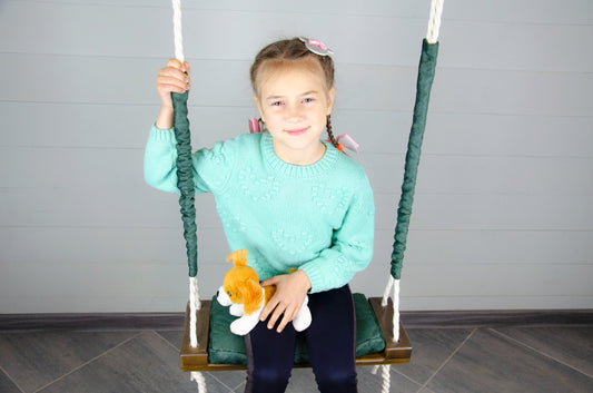 Children's Inside Natural Swing With A Green Seat