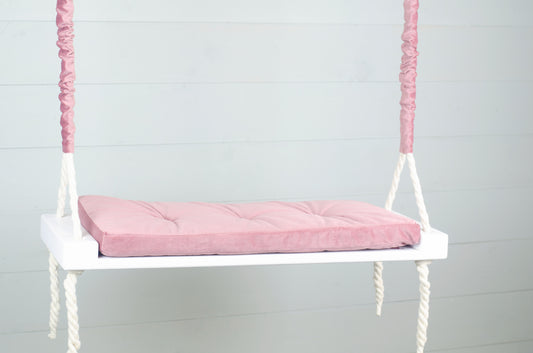 Adult Inside White Swing With A Pink Seat