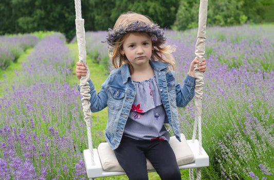 Children's Inside White Swing With A Beige Seat