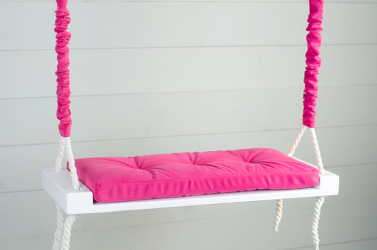 Adult Inside White Swing With A Hot Pink Seat
