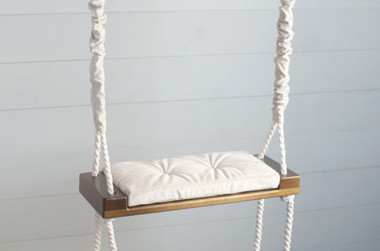 Children's Inside Natural Swing With A Beige Seat