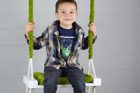 Children's Inside White Swing With A Green Seat