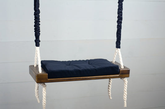 Children's Inside Natural Swing With A Black Seat